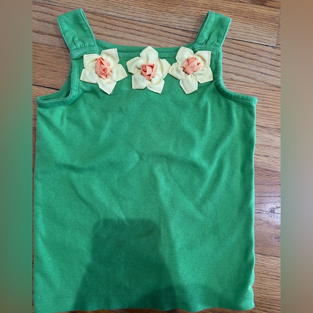 Gymboree girls tank top. Size 5. Green with yellow Flowers on the front.